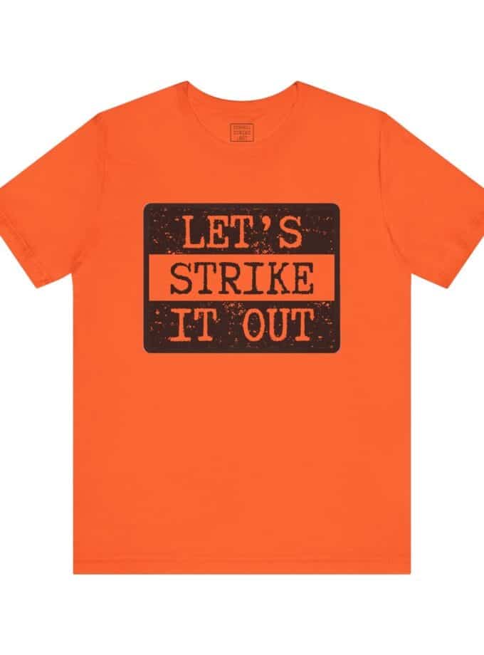 "Let's Strike It Out" T-Shirt – Unisex Tee for Peaceful Protest & Everyday Solidarity, (Black Image)
