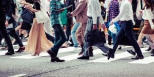 Decentralized leadership through collective movement People moving in the same direction together, symbolizing decentralized leadership and collective coordination in a general strike